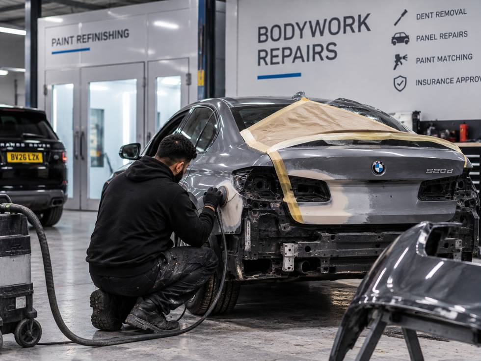Bodywork being prepared for refinishing at a repair centre